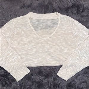 Thin sweater with neck cutout
